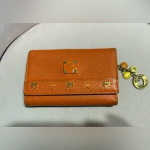 MCM Orange Leather  Wallet with Gold Accents And Charm ✨️🧡